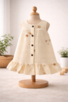 Little Apple Baby Girls Muslin Cotton Sleeveless Frock – Cream Printed, Button Front, Ruffled Hem (0–24 Months)